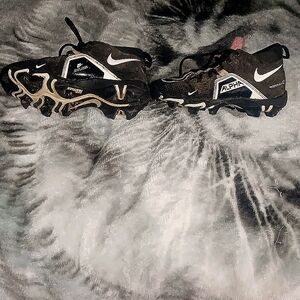 Black and white, alpha cleats